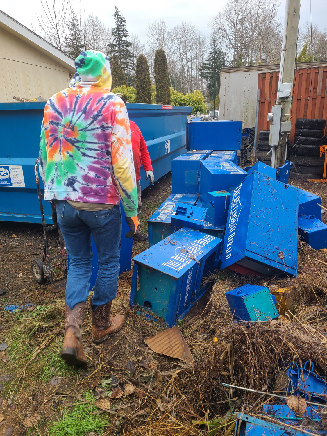 Lukerative Junk Removal team clearing property debris